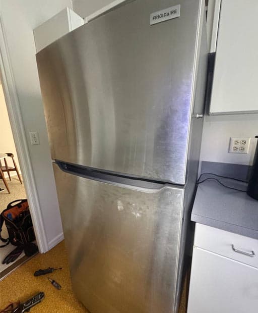 Frigidaire appliance technician repair service New York City